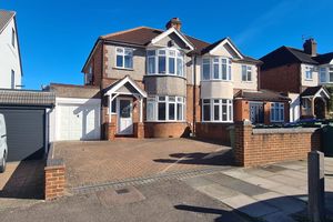 Front with driveway- click for photo gallery